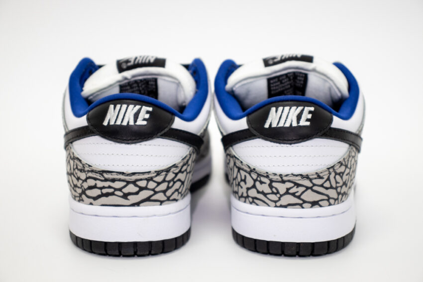 nike dunk low white cement